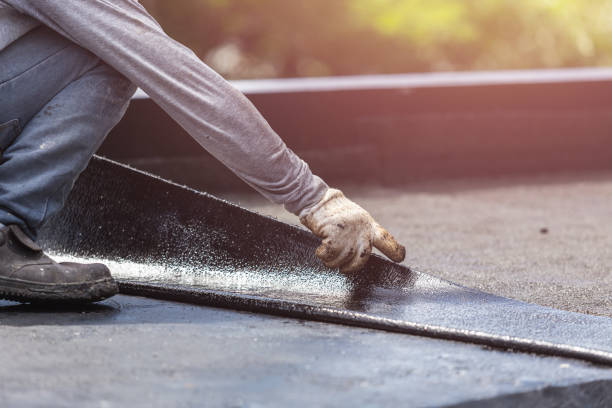 Professional Basement Waterproofing technician working in Oxford, WI